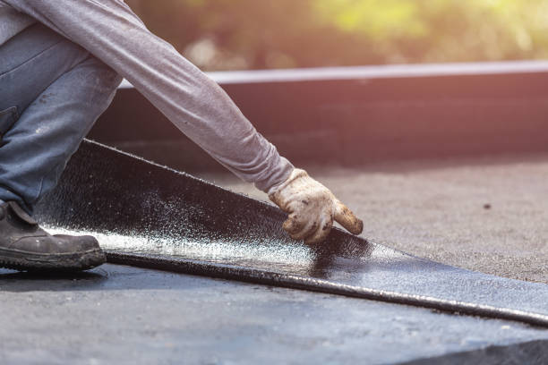 Professional Basement Waterproofing technician working in Georgetown, GA